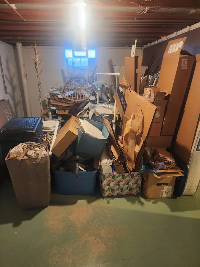 Roll-off dumpster container at job site for 2 Yard Dumpster Rental in Manning